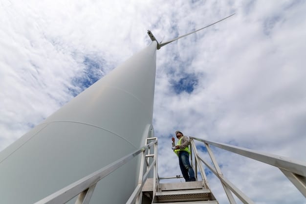 Image of workers assembling wind turbine blades at a manufacturing plant in Iowa.