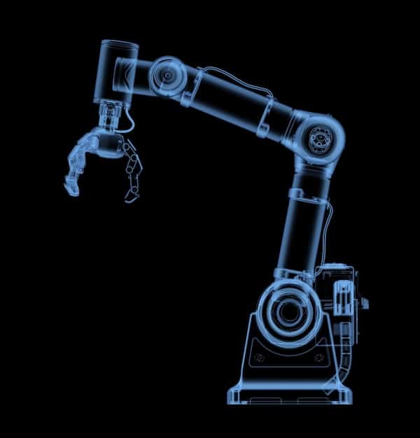 A close-up of a robotic arm assembling products in a high-tech factory, with a holographic display showing real-time production data and analytics overlayed on the scene. This illustrates the use of AI and automation in manufacturing.