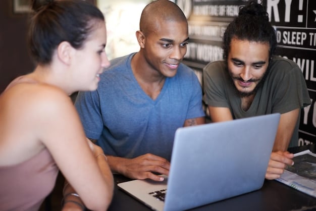 A college athlete working on a laptop with a financial advisor, discussing investment options, symbolizing the importance of financial literacy in the NIL era.