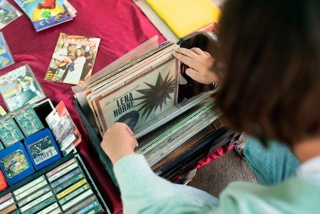Close-up shot of a person browsing through a selection of affordable art prints at a local art fair. The prints are diverse in style and subject matter, showcasing an accessible entry point into art collecting.