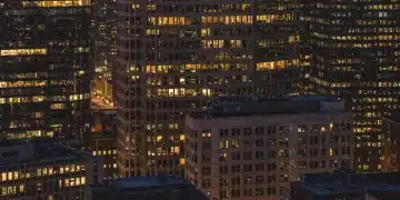 Modern corporate office building at dusk, symbolizing business and tax reform
