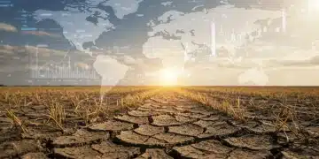 Barren field representing crop yield decline with global financial and policy overlay