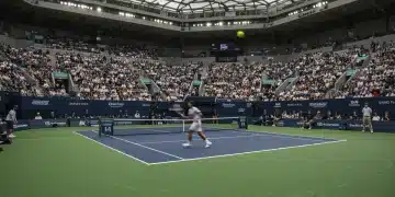 2025 Tennis Grand Slam Season: 3 Biggest Surprises So Far Dynamic tennis match in a packed Grand Slam stadium
